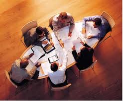 immagine di una riunione di lavoro con sei partecipanti