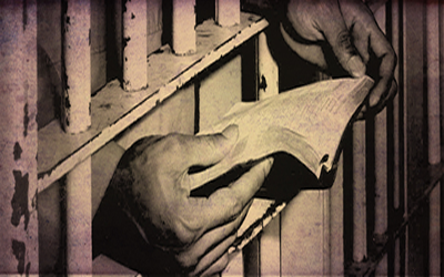 immagine di un detenuto che legge un libro